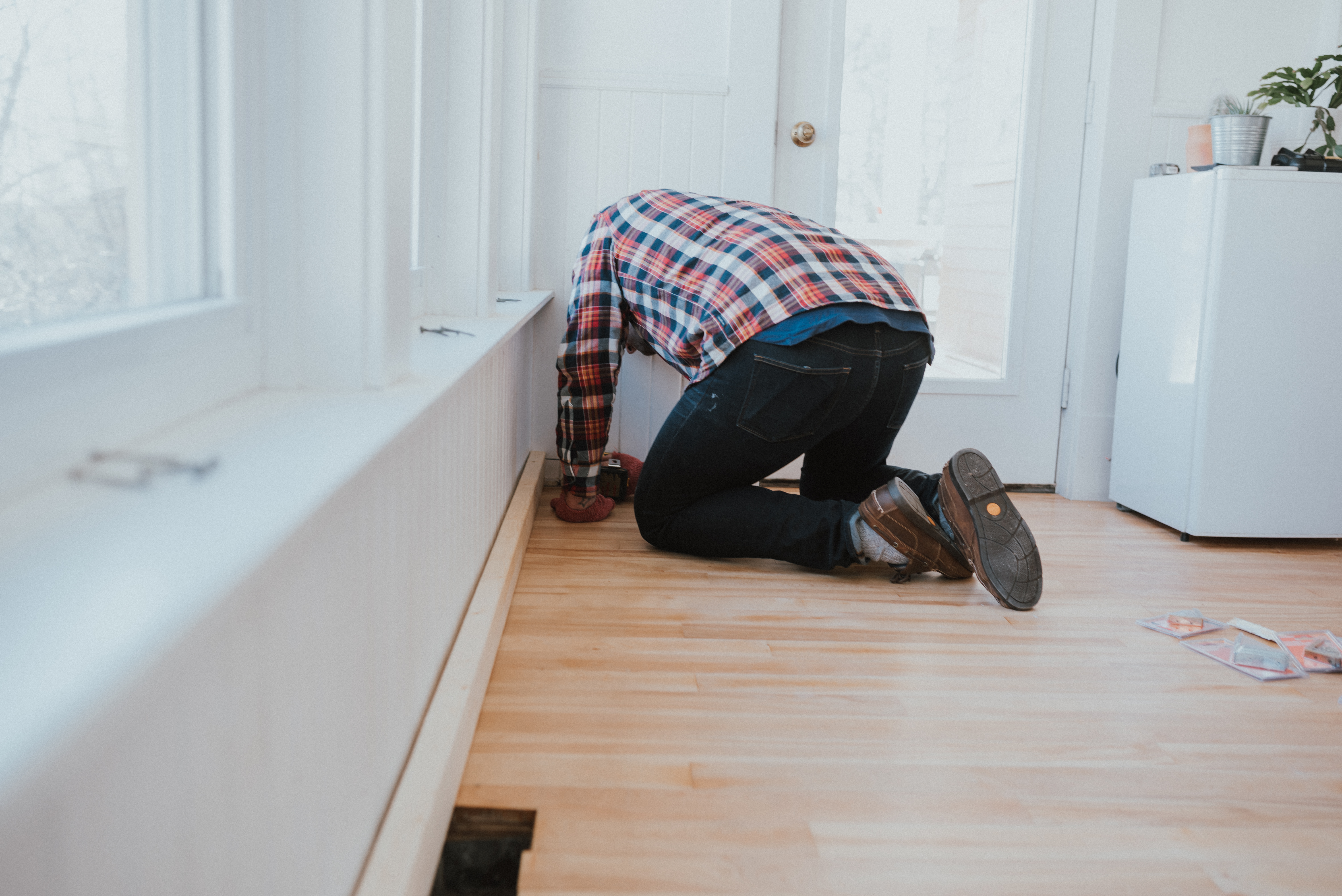 THe Wild Decoelis | DIY Built In Bench | Alexandria Moulding | attaching framing to studs