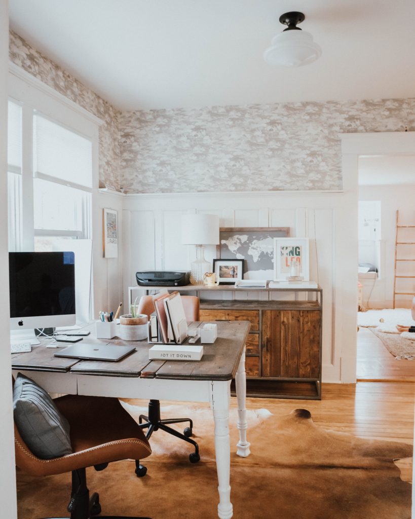 The Wild Decoelis | Top Tips For Working From Home When Kids Are Home  | home office with antique Dining table as desk and wallpaper, schoolhouse light, and credenzaas desk and wallpaper, schoolhouse light, and credenza