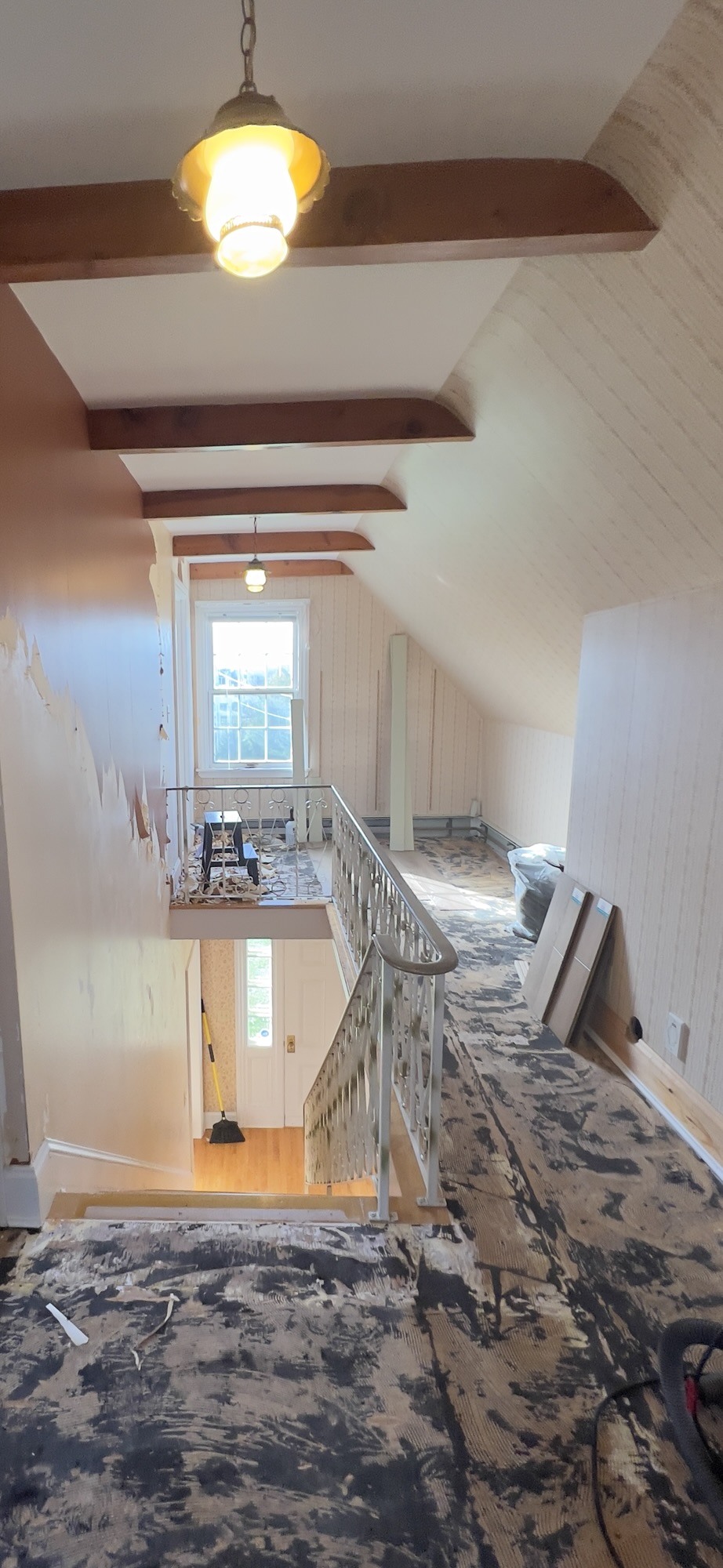 beadboard and beamed hallway