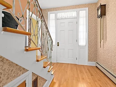 beadboard and beamed hallway