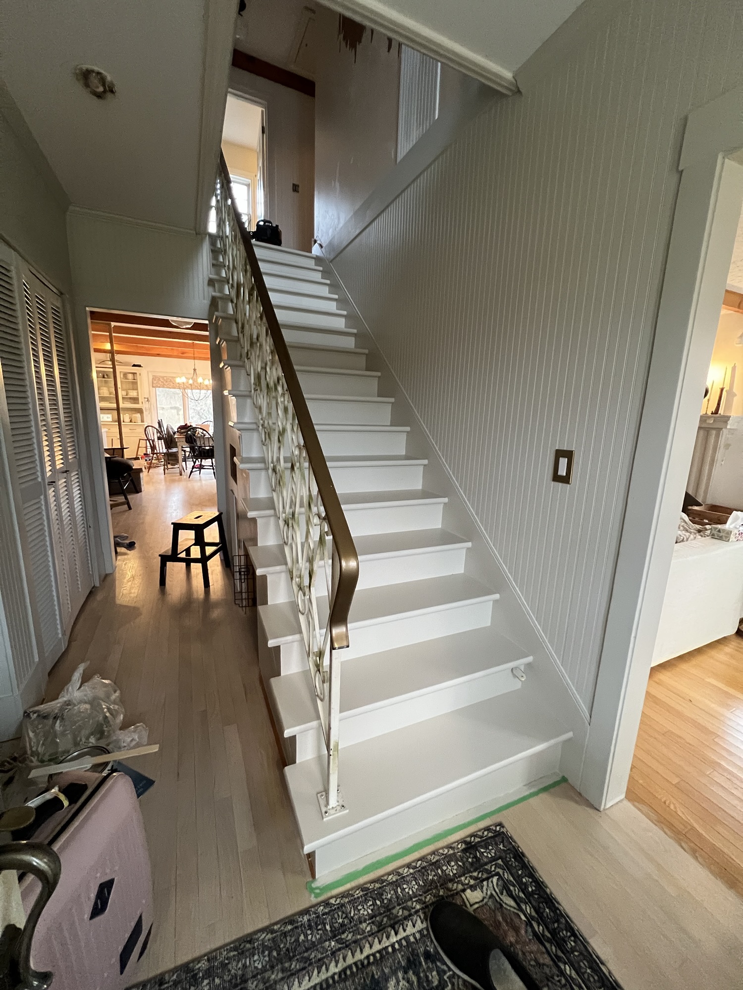 beadboard and beamed hallway