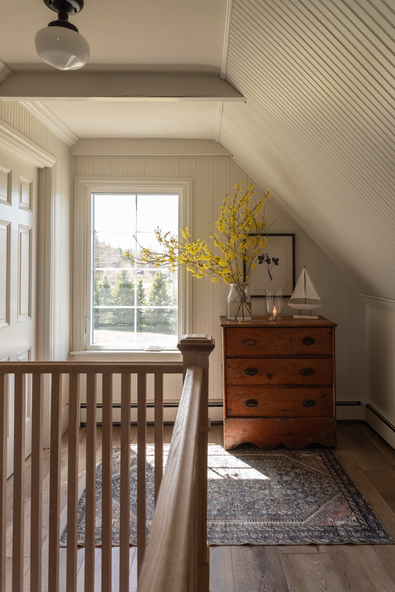 beadboard and beamed hallway
